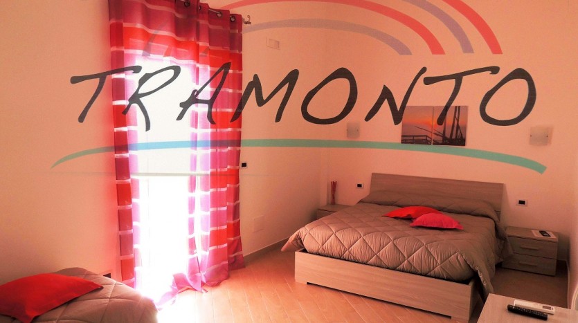 I colori caldi della camera Tramonto a Villa Simone